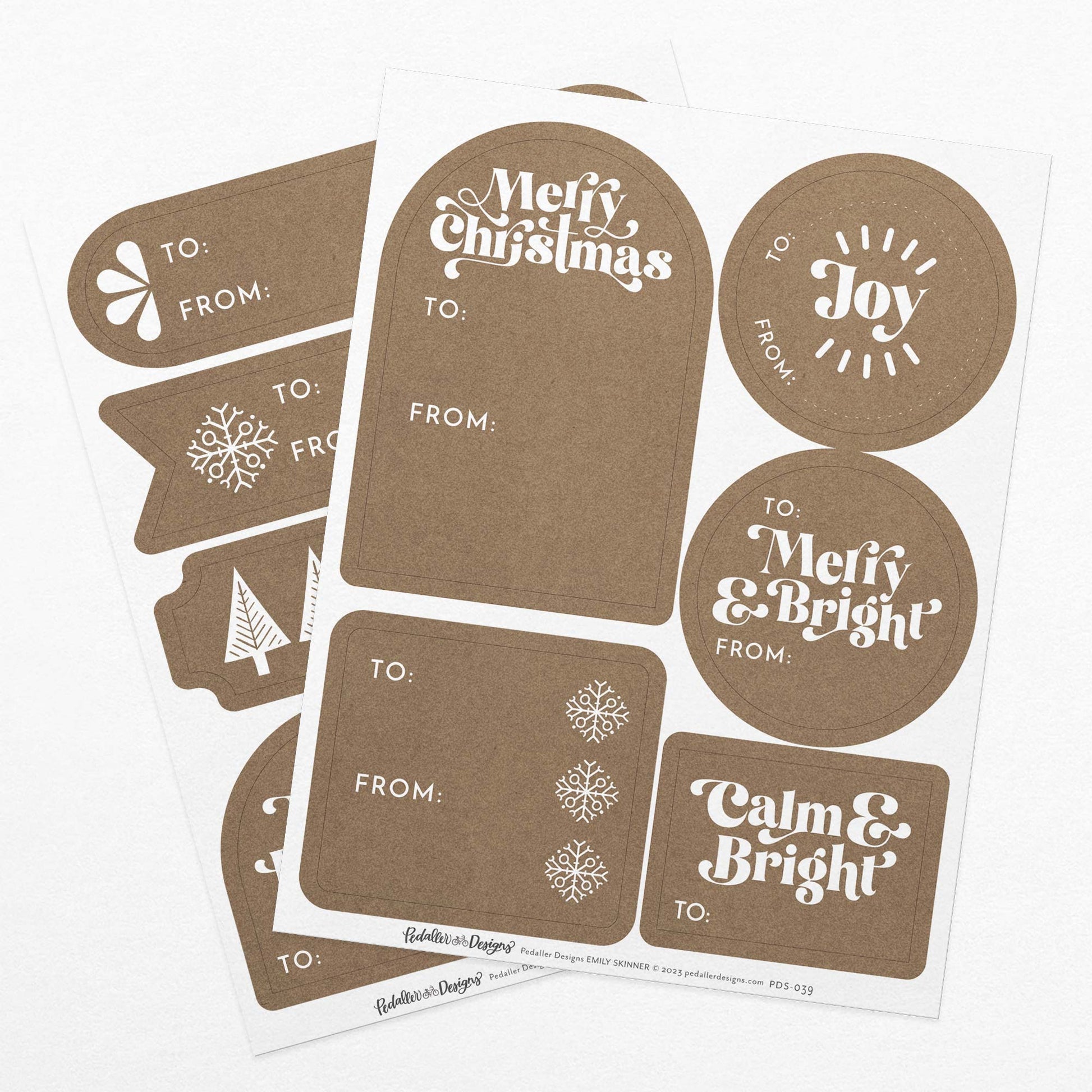 Modern Christmas gift tag sticker set with 2 sheets of modern white lettering on a kraft paper background. Perfect to use as a gift tag on presents or gift boxes.