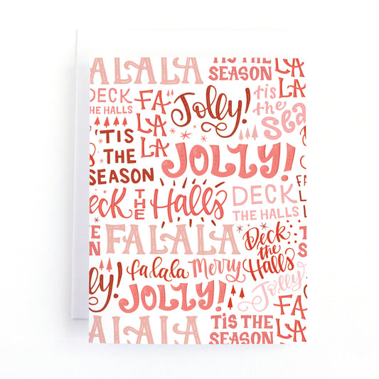 Christmas card with a hand lettered word collage of the lyrics to deck the halls