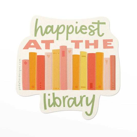 Book themed vinyl sticker with a colourful stack of books and the text, "happiest at the Library" in pink and green.
