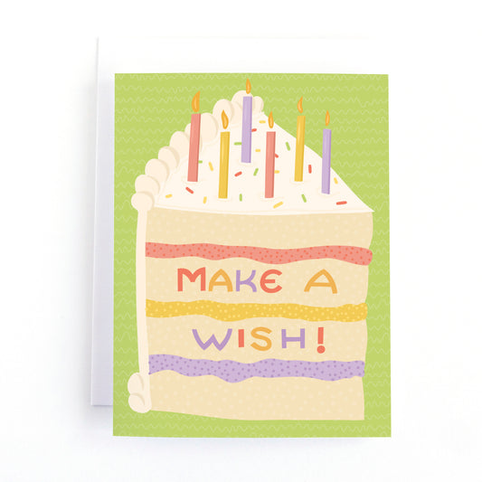 Colourful birthday card with an illustration of a slice of cake loaded with candles and the text, "make a wish!"