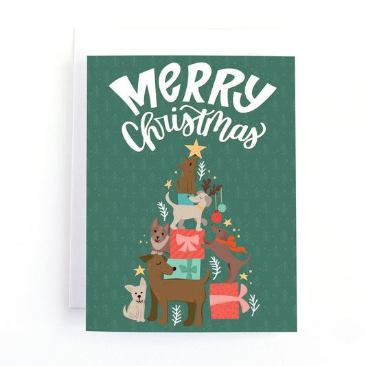 dog themed christmas card with illustrations of dogs and presents stacked up in the shape of a christmas tree and the text, Merry christmas