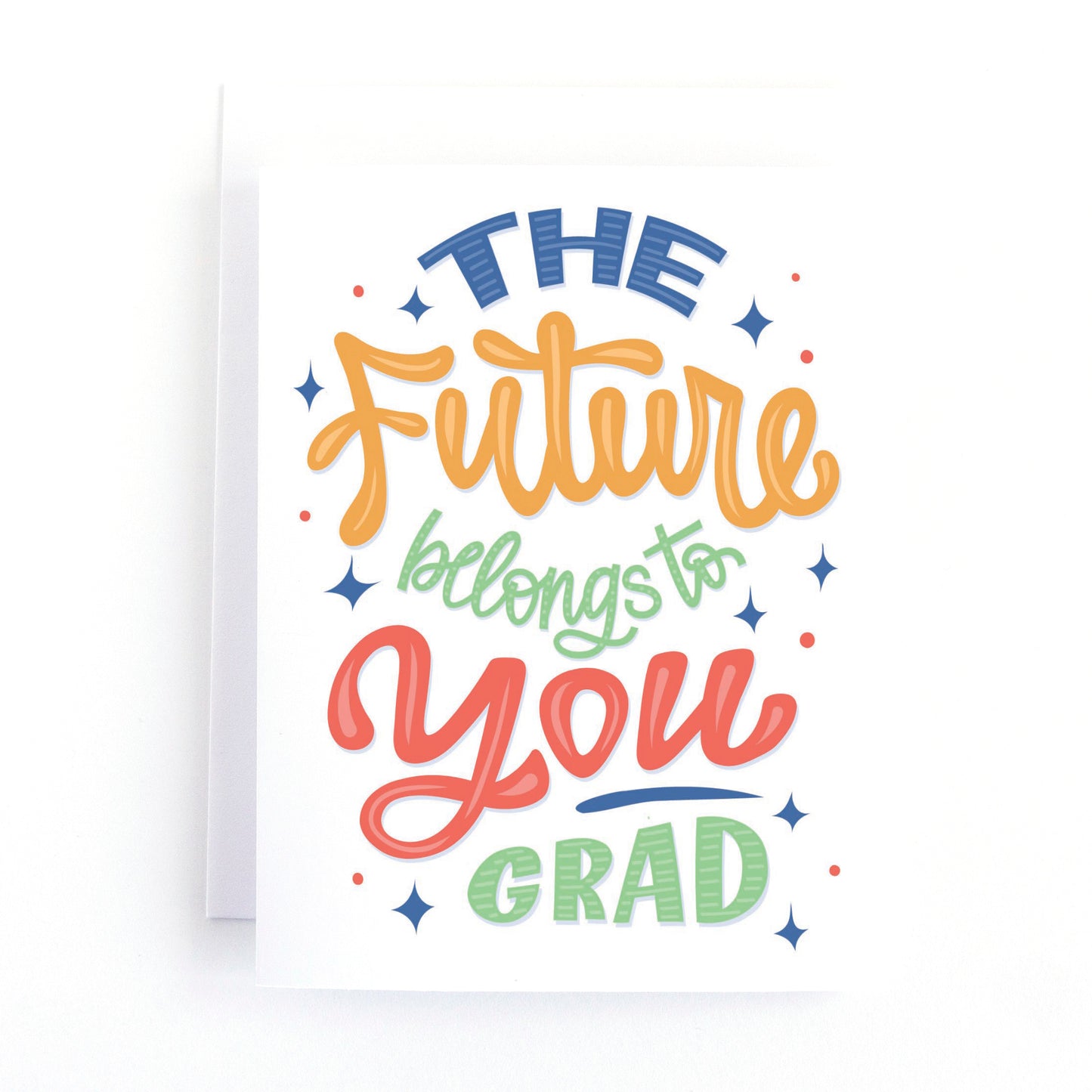 Graduation card with the hand lettered text, The future belongs to you Grad.