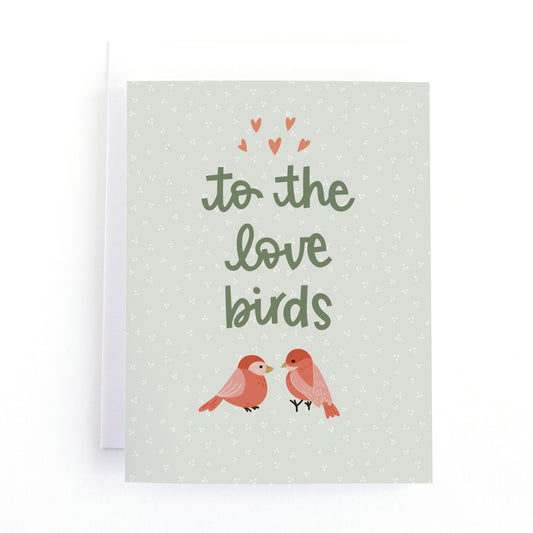 Hand-drawn wedding card with two love birds and “To the Love Birds.” Perfect for nature lovers, woodland weddings, and celebrating love.