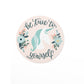 vinyl sticker with a unicorn surrounded by flowers and the text be true to yourself on a pink background.