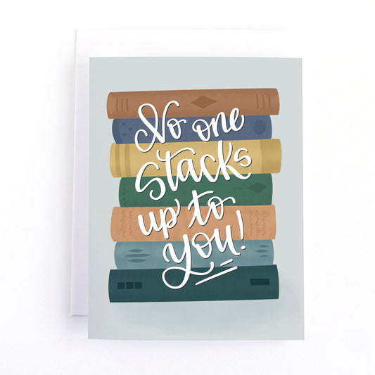Valentine's Day card with an illustration of a stack of books and the text, no one stack up to you