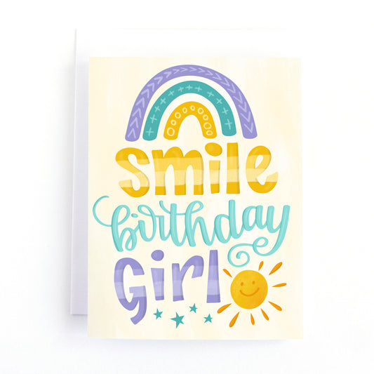 colourful girl's birthday card with and modern rainbow and playful sun.