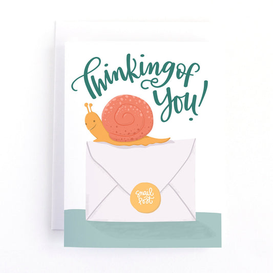 A cute thinking of you greeitng card featuring a snail and a piece of mail.
