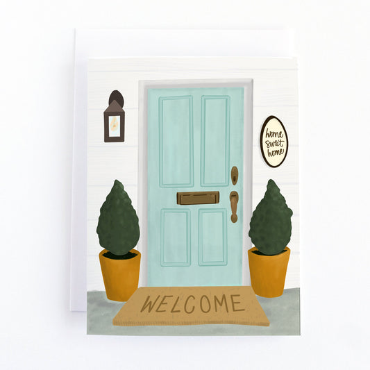 Greeting card to congratulate new home owners featuring a modern and elegant front door step with potted trees and Welcome door mat and a home sweet home sign.