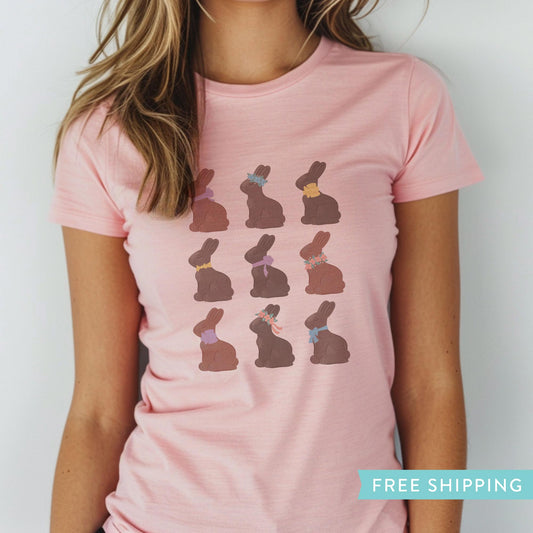 women's pink easter graphic tee with illustrations of chocolate bunnies.