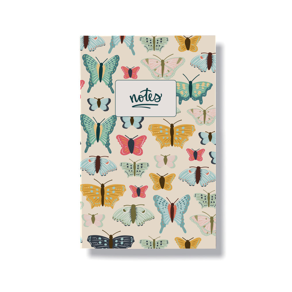 5.5x8.5" notebook with a hand drawn cover featuring colourful butterflies. Notebook contains 60 lined pages.