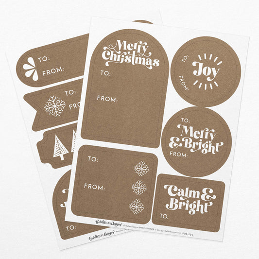 Modern Christmas gift tag sticker set with 2 sheets of modern white lettering on a kraft paper background. Perfect to use as a gift tag on presents or gift boxes.