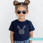 kids navy tshirt with a silhouette of a rabbit in hand drawn spring flowers.