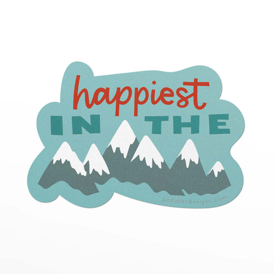 Mountain themed vinyl sticker with snow capped mountains on a blue-green background with colourful lettering that says, "happiest in the..."