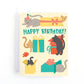 cat themed birthday card with playful cats plating in boxes and wrapped presents.
