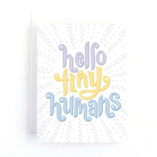 Cute new baby card for twins or multiples with the hand lettered greeting, hello tiny humans