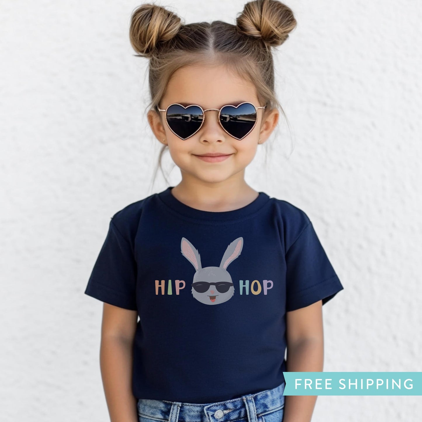 Kids navy easter t-shirt with an illustration of a bunny rabbit wearing sunglasses and the hand lettered text, "hip hop"