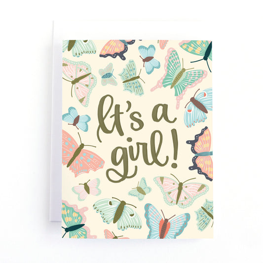 New baby girl card with colourful butterflies in pastel tones and the message, It's a girl!