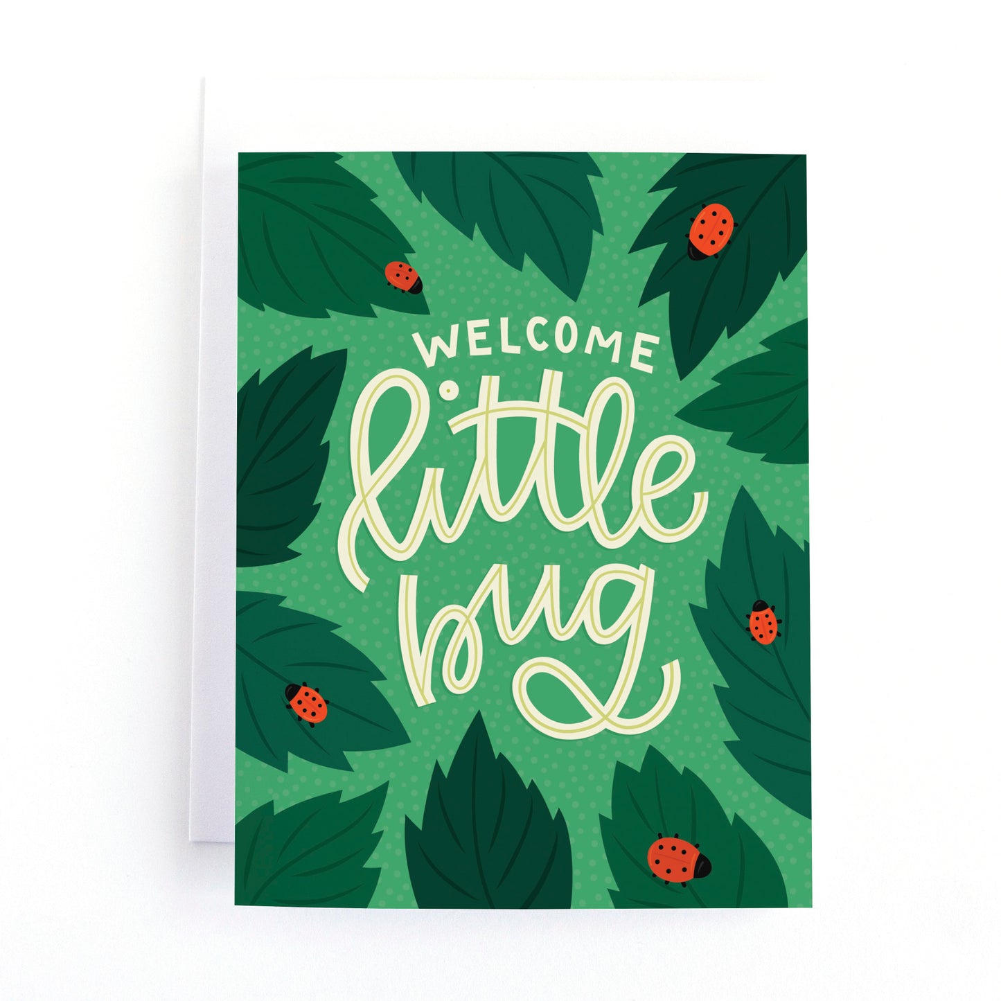 New baby card with a bright green background with leaves and ladybugs and the greeting, welcome little bug.