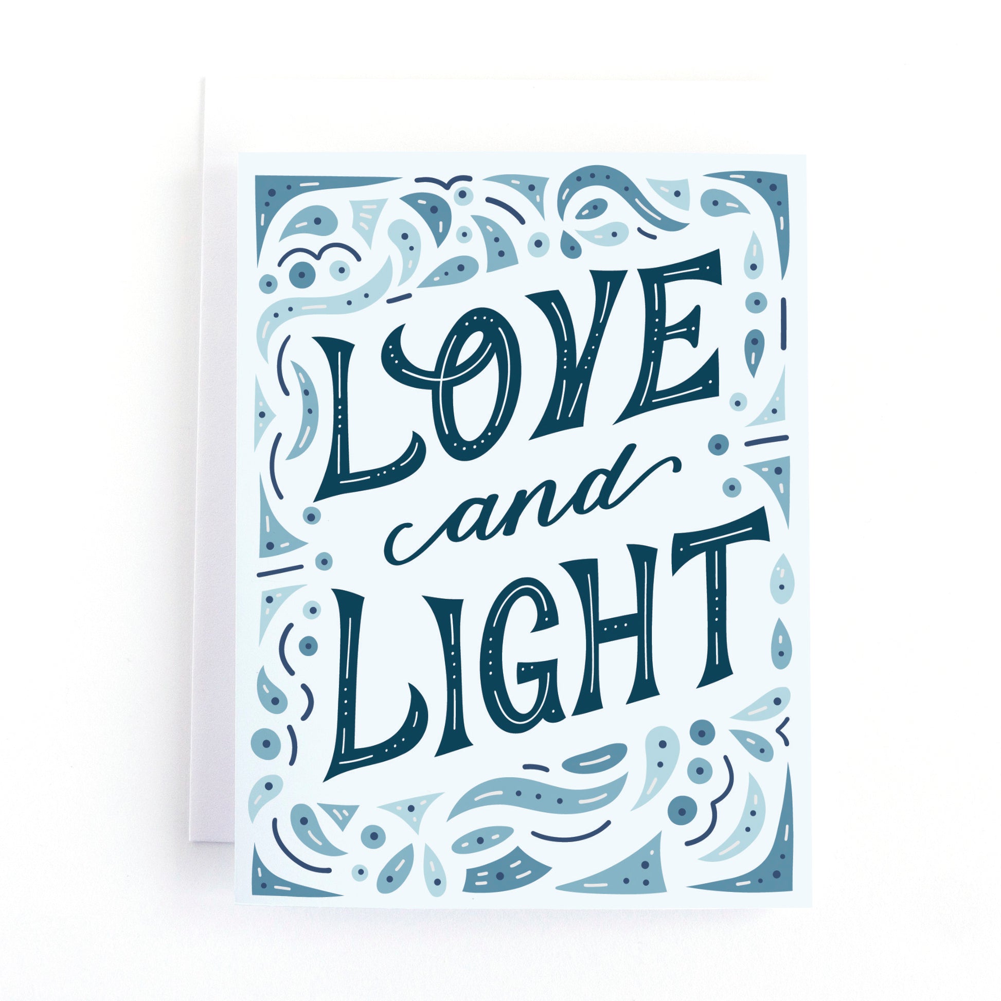 Hanukkah card featuring the message love and light surrounded by an intracate border of shapes and lines