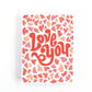 Valentine's Day card with red retro lettering that says, Love you surrounded by a pattern of pink and coral hearts