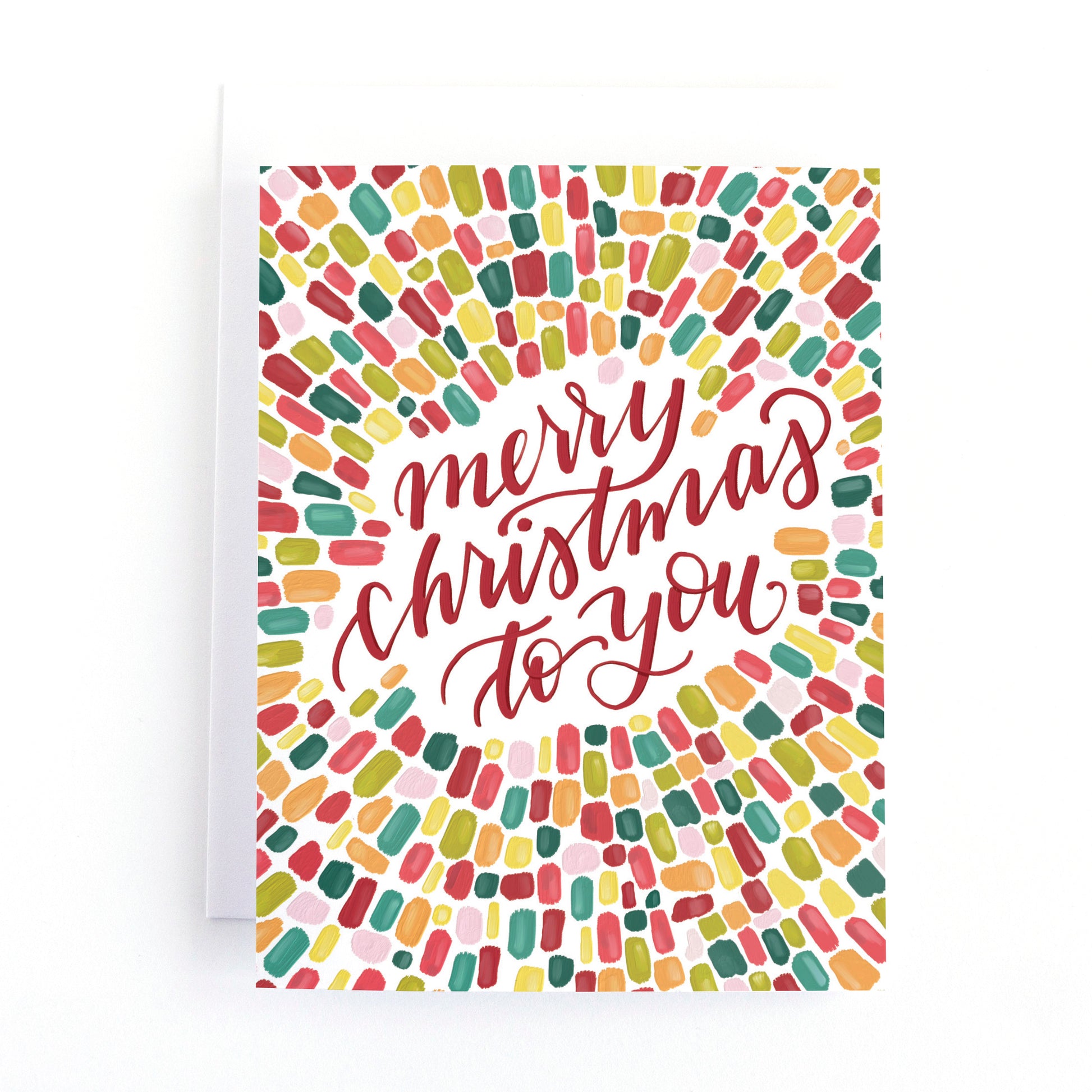 Brightly coloured christmas card with a handpainted mandala pattern and the greeting merry christmas to you.