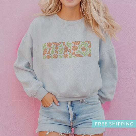 Women's Grey Sweatshirt with pink flowers and green leaves.