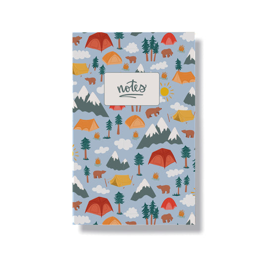 Camping themed notebook sized at 5.5x8.5 inches with 60 lined pages. Cover features hand drawn mountain, camping and woodland illustrations.