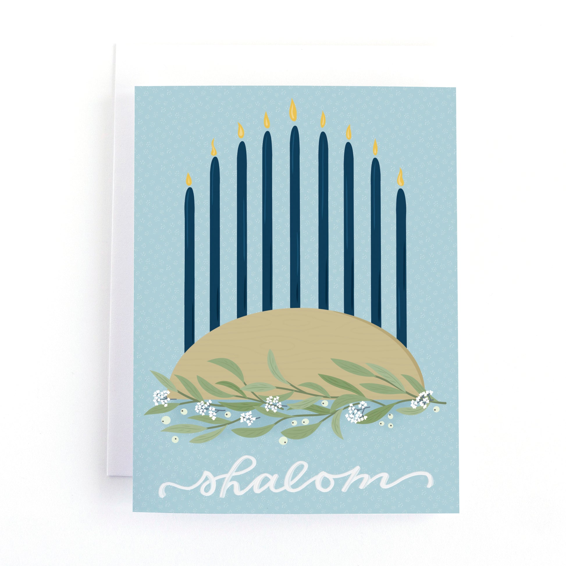 Hanukkah card with a modern menorah and lit candles and the message shalom.