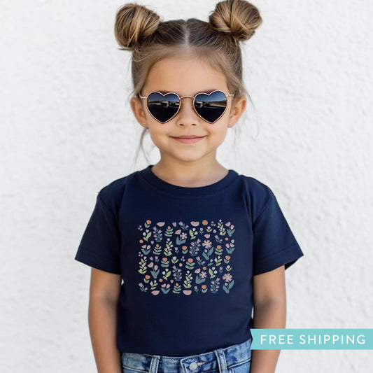 girl's navy t-shirt with colourful spring flowers.