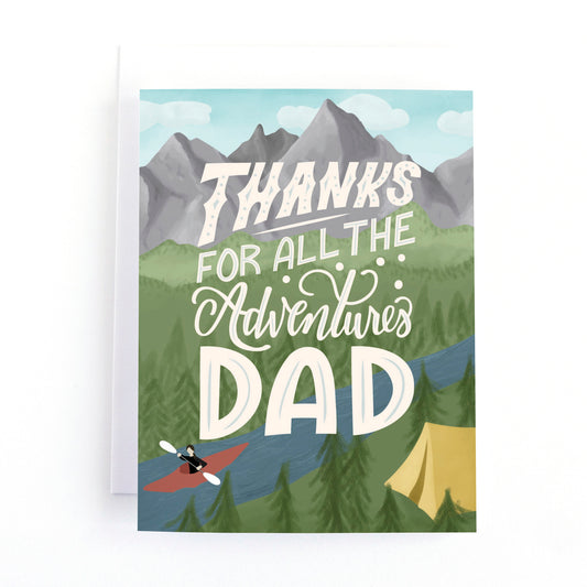 Father's day card featuring a mountain illustration and the hand lettered text, thanks for all the adventures dad.