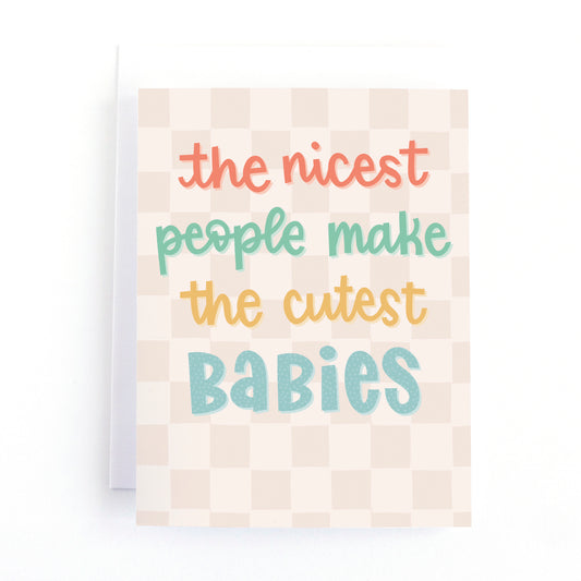 Modern new baby card with a gender neutral colour palette and the hand written text, the nicest people make the cutest babies.