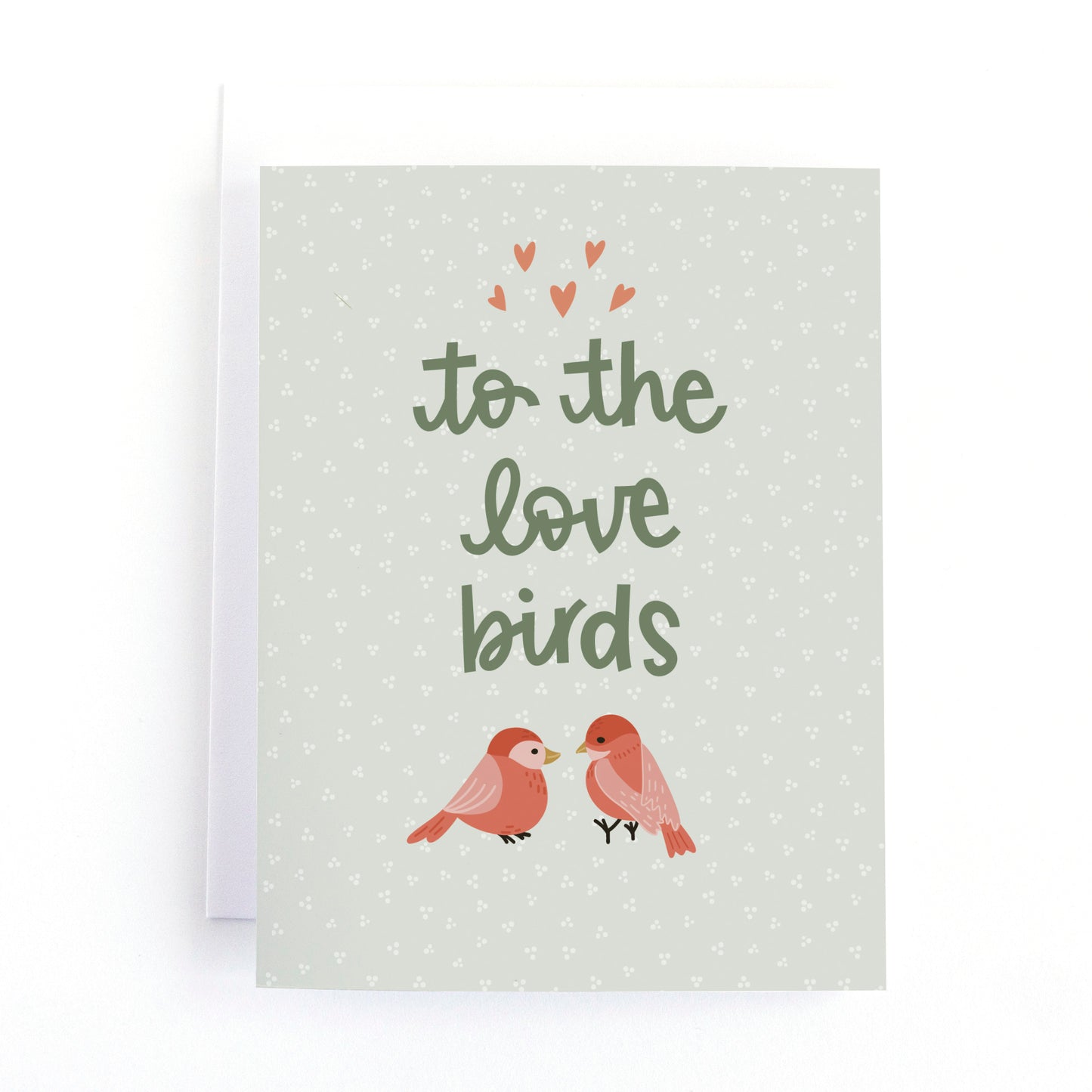 Hand-drawn wedding card with two love birds and “To the Love Birds.” Perfect for nature lovers, woodland weddings, and celebrating love.
