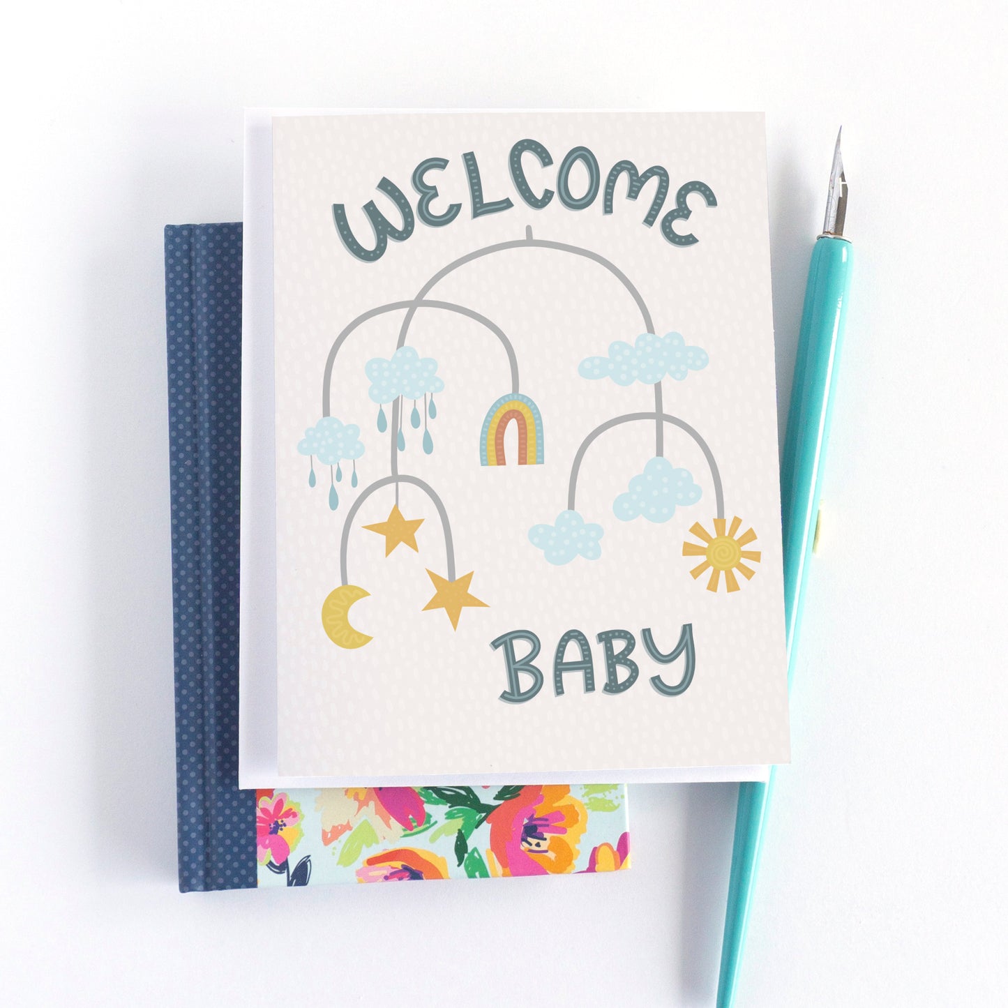 hand-drawn gender neutral welcome baby shower card with modern mobile illustration