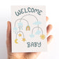 gender neutral welcome Baby card for baby showers with modern mobile illustration