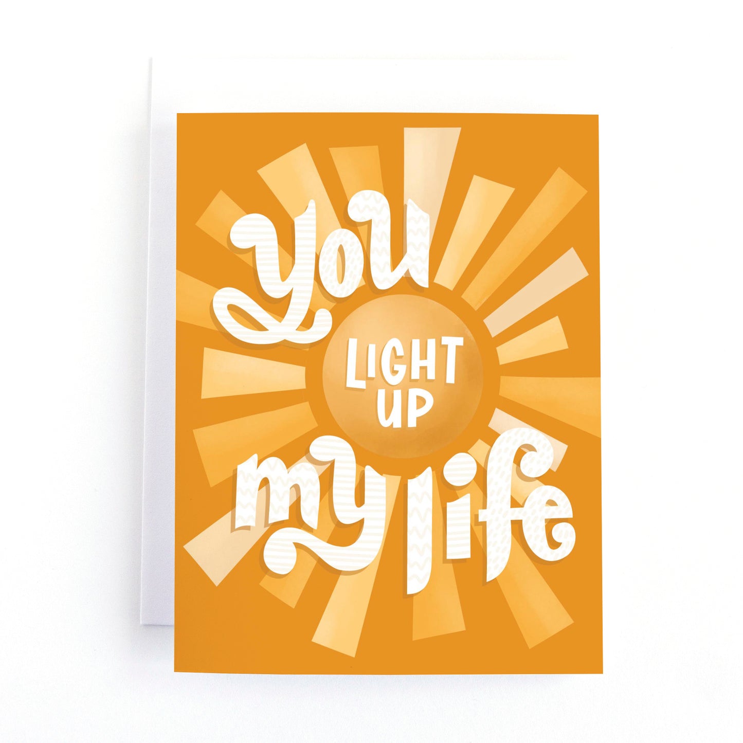Friendship or Love card with an illustration of a retro sun and the message, You light up my life.