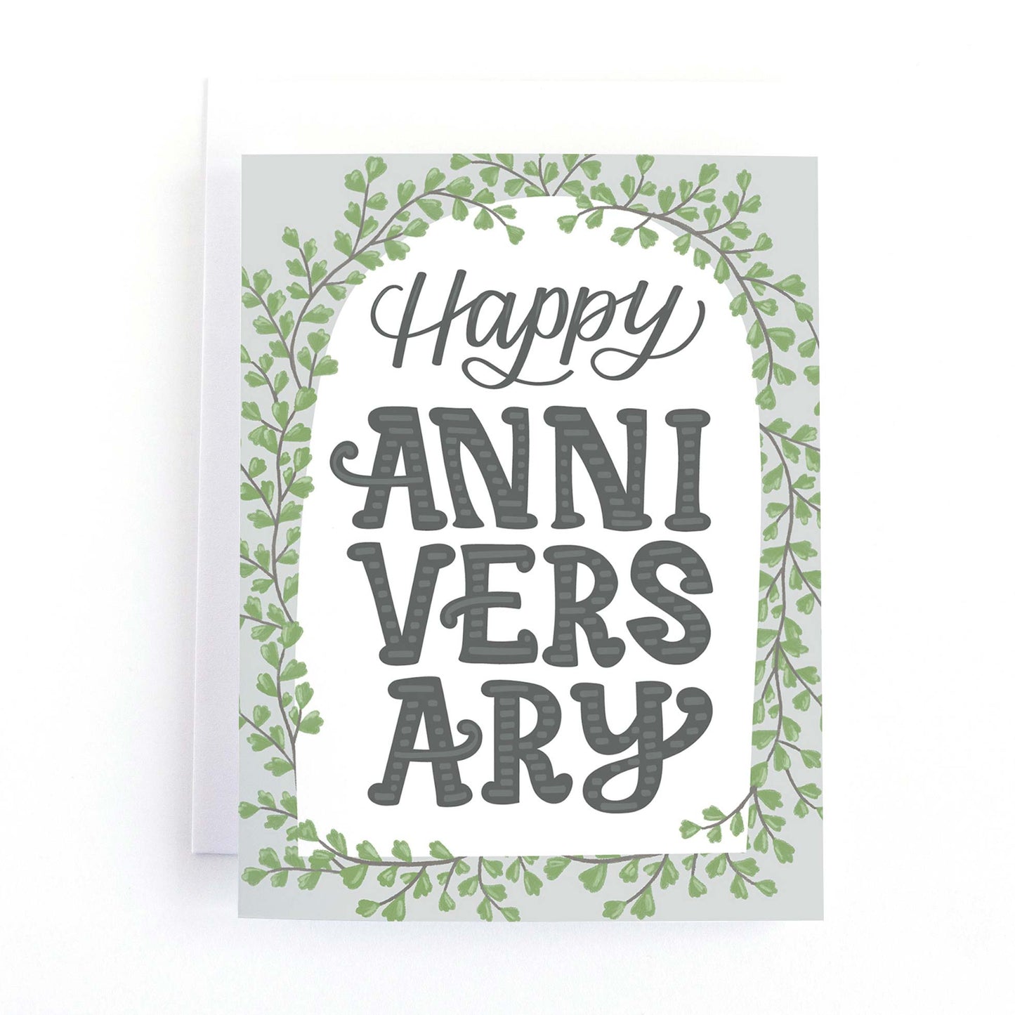 Anniversary card with an elegant arch of greenery around the text, happy anniversary.