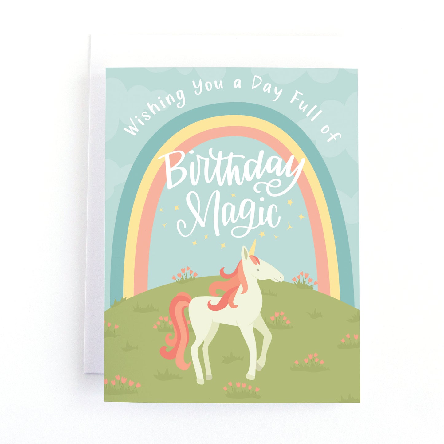 Kids Unicorn birthday card with a rainbow and pink flowers