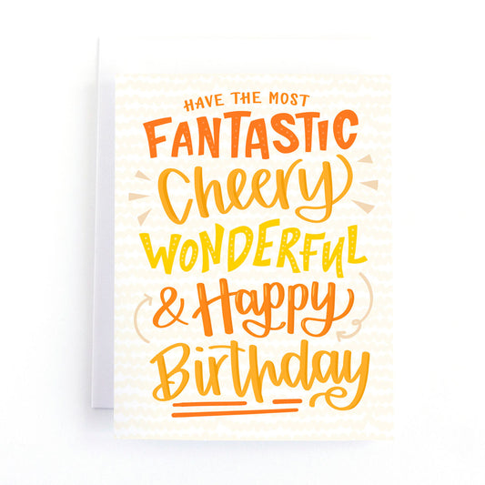 birthday card featuring a hand lettered greeting that says, have the most fantastic, cheery, wonderful and happy birthday.
