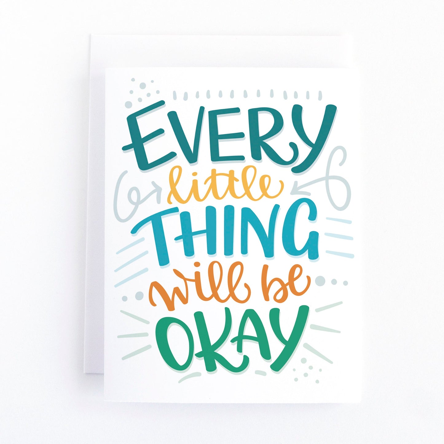 Sympathy card with multicoloured hand lettering on a white background that says, Every little thing will be okay.