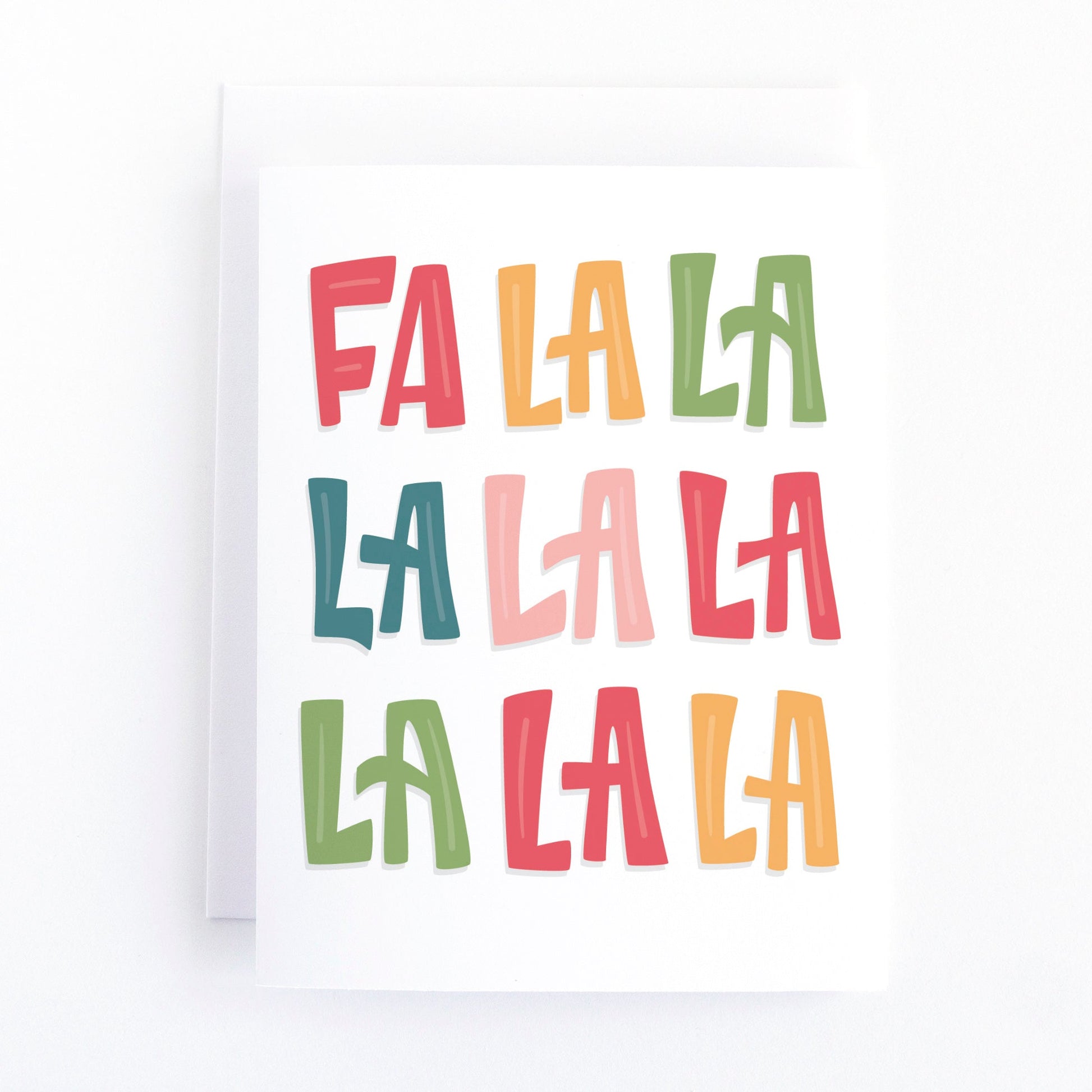 Simple christmas card with colourful lettering that says FA LA LA LA LA LA LA LA