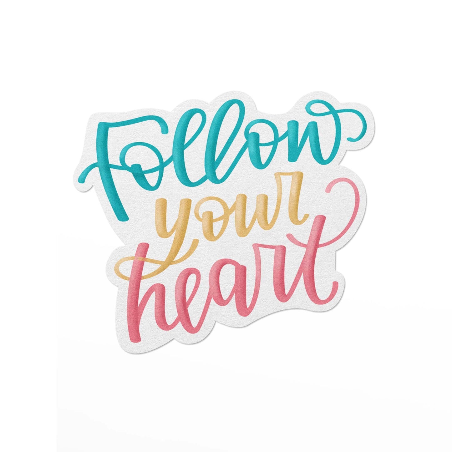 Vinyl sticker with rainbow lettering that says, follow your heart.