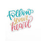 Vinyl sticker with rainbow lettering that says, follow your heart.