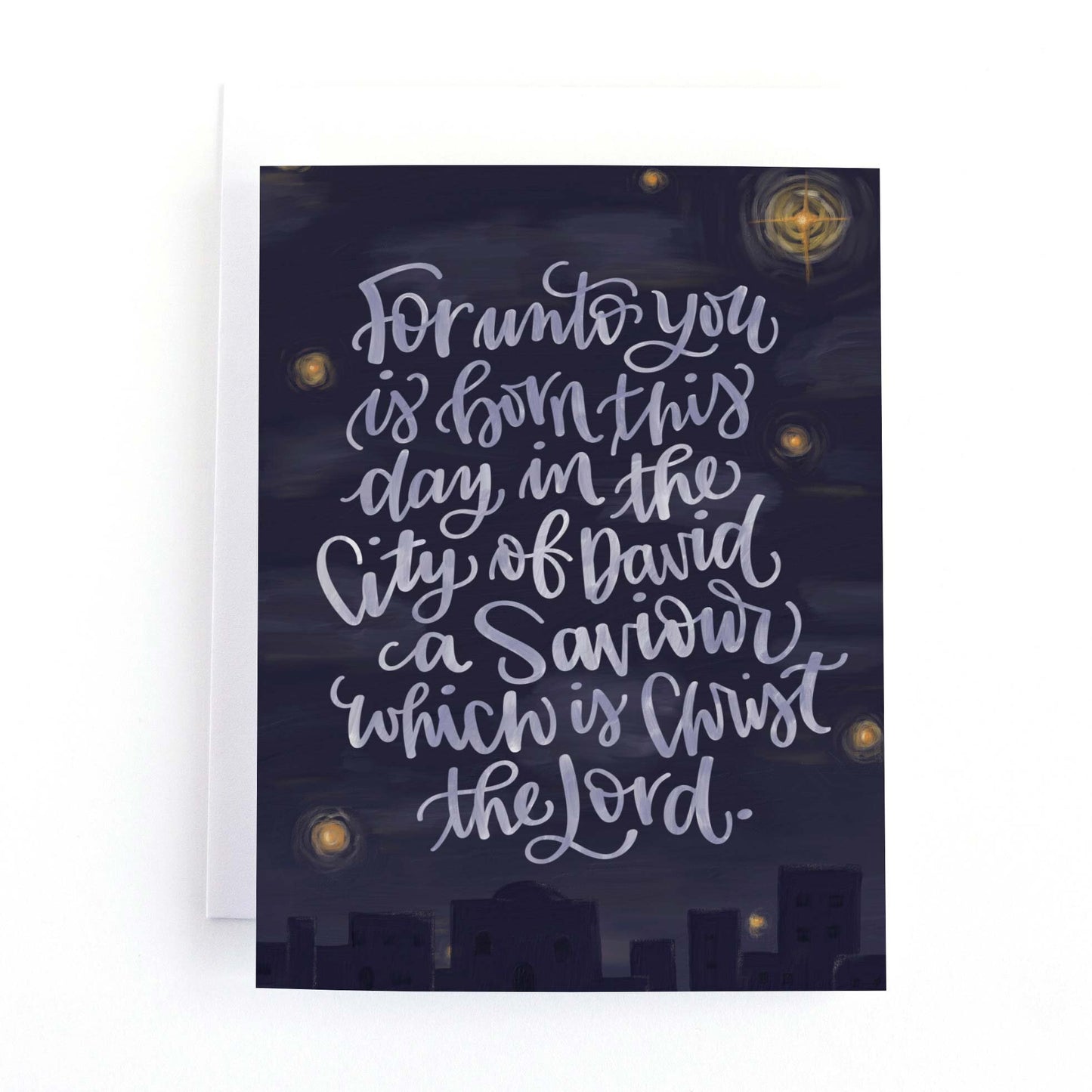 Christmas card featuring a hand lettered bible verse and a hand painted illustration of the christmas star over bethlehem