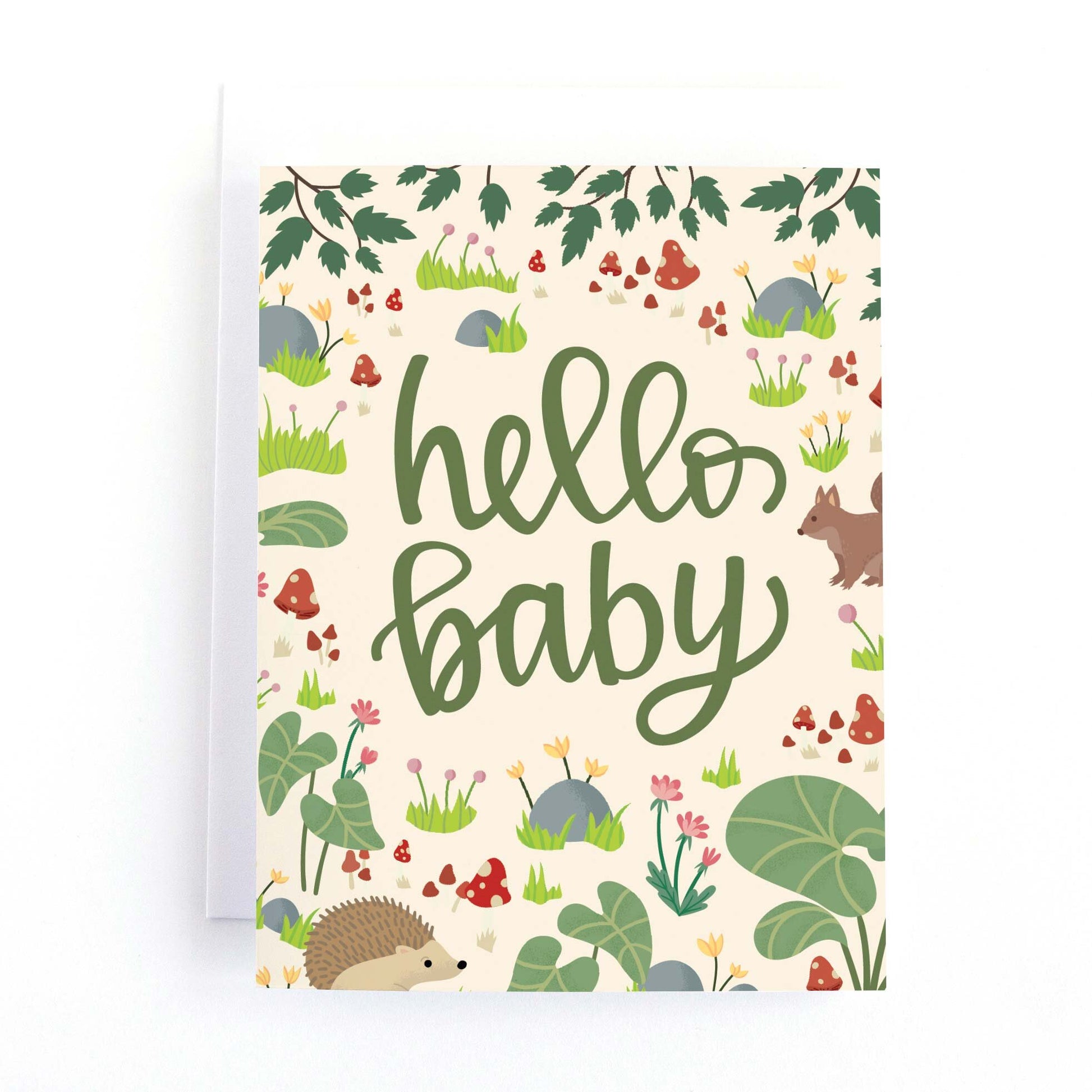 Baby Shower card with woodland forest illustrations including a squirrel, hedgehog and mushrooms and the message hello baby