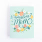 Mothers day card with a bouquet of flowers surrounding the hand lettered text, Marvelous mom on a light blue background.