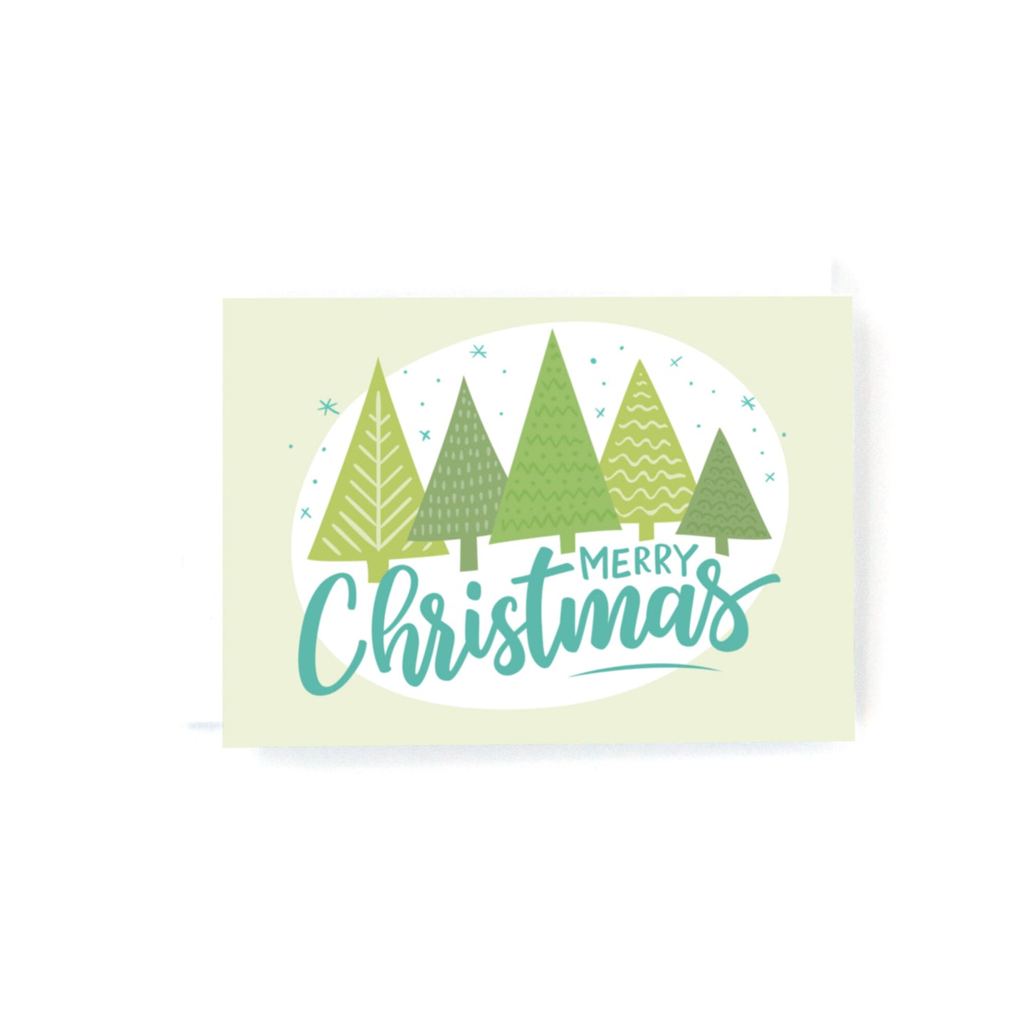 mini christmas card with minimalist christmas trees and the text, Merry christmas on a green background.