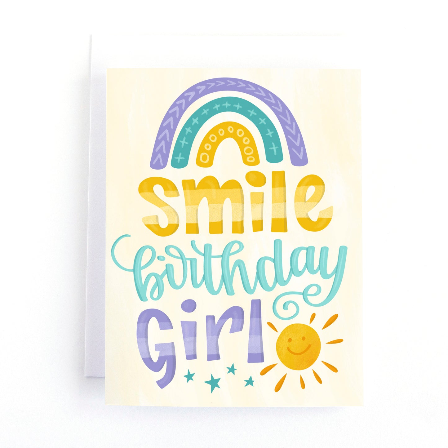 colourful girl's birthday card with and modern rainbow and playful sun.