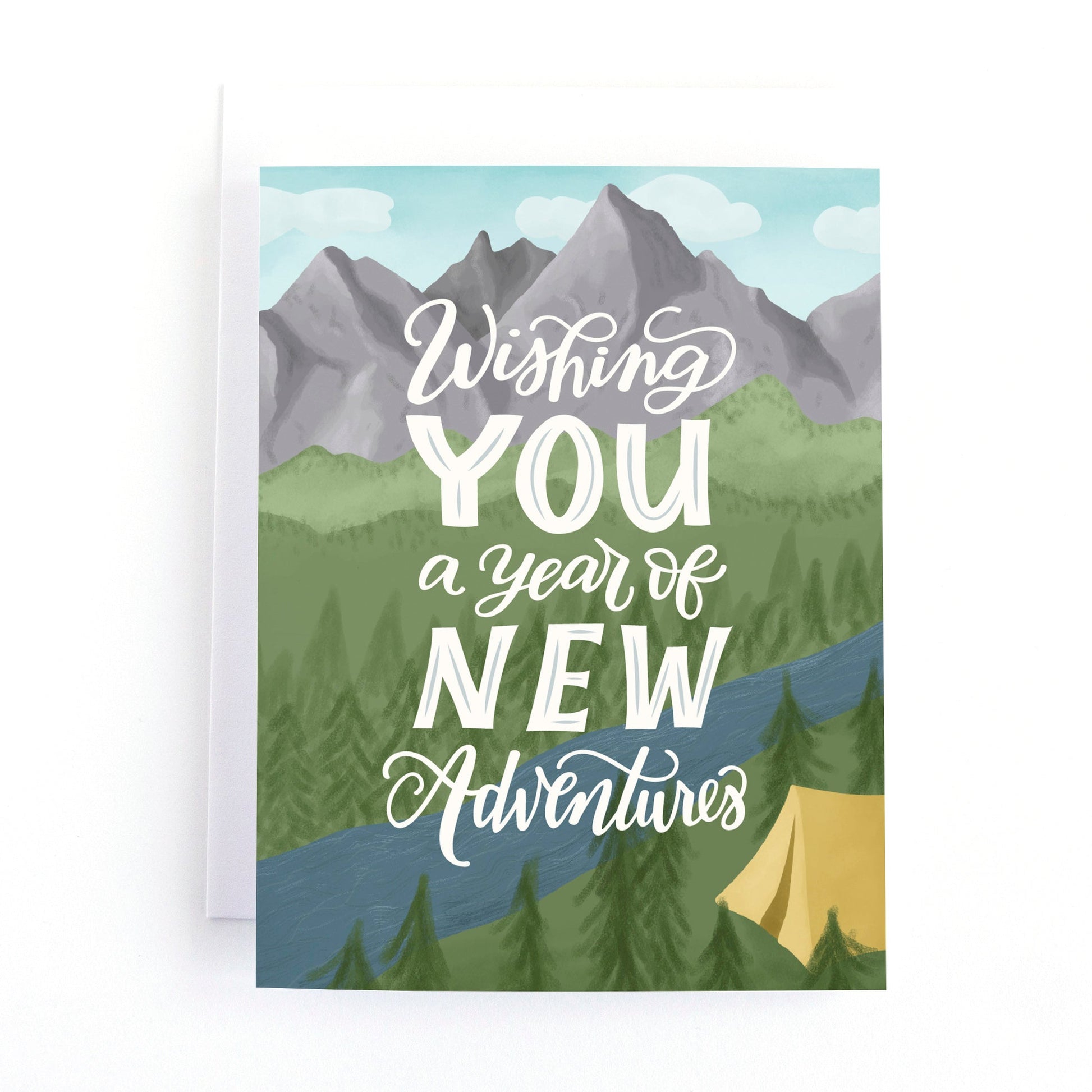 Birthday card featuring a mountain camping scene and the greeting, "wishing you a year of new adventures."