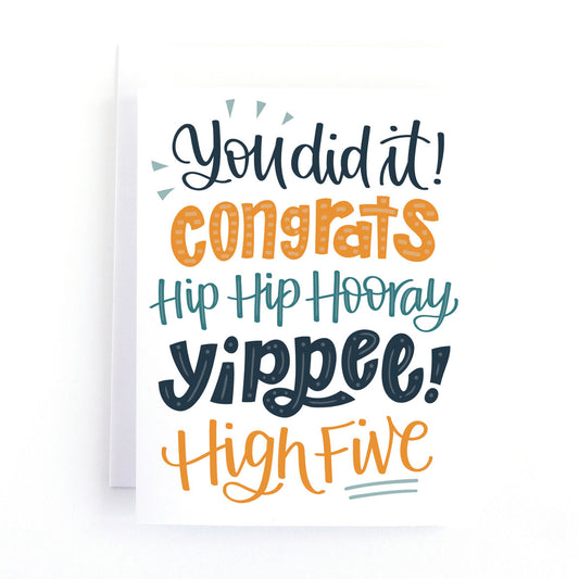 Congratulations card with hand lettering that says You did it Congrats, Hip Hip Hooray, Yippee! High Five in blue and orange.